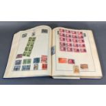 A Strand Stamp Album to include stamps of the world mainly used