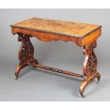 A Victorian Walnut and Marquetry inlaid Centre Table of rectangular form with twin end pierced