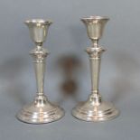 A Pair of Birmingham Silver Candlesticks with circular bases, 14cm tall