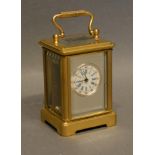 A Brass Cased Miniature Carriage Clock the silvered and enamel dial with roman numerals and lever