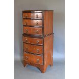 An Early 20th Century Mahogany Bow-fronted Chest on Chest with an arrangement of six drawers with