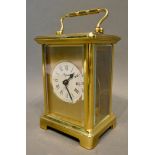 A Brass Cased Carriage Clock by Bayard, the enamel dial with Roman numerals and lever escapement