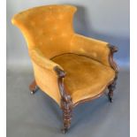 A Victorian Rosewood Drawing Room Tub Shaped Chair with scroll arms, serpentine seat raised above