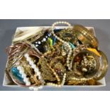 A Collection of Jewellery to include bangles, bead necklaces, brooches and other items