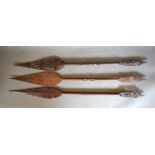 A Group of Three African Carved Hardwood Spears, 172cm long