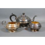 A George V Birmingham Silver Three Piece Tea Set comprising teapot, cream jug and sucrier, all of