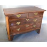 A 19th Century Mahogany Chest with cross-banded top, above two short and two long drawers with brass