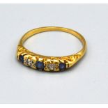 A 18ct Yellow Gold Sapphire and Diamond Ring set with three sapphires and two diamonds, Size N, 2.