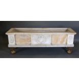 A Neo-Classical Style Variegated Marble Large Planter of rectangular form raised upon four brass