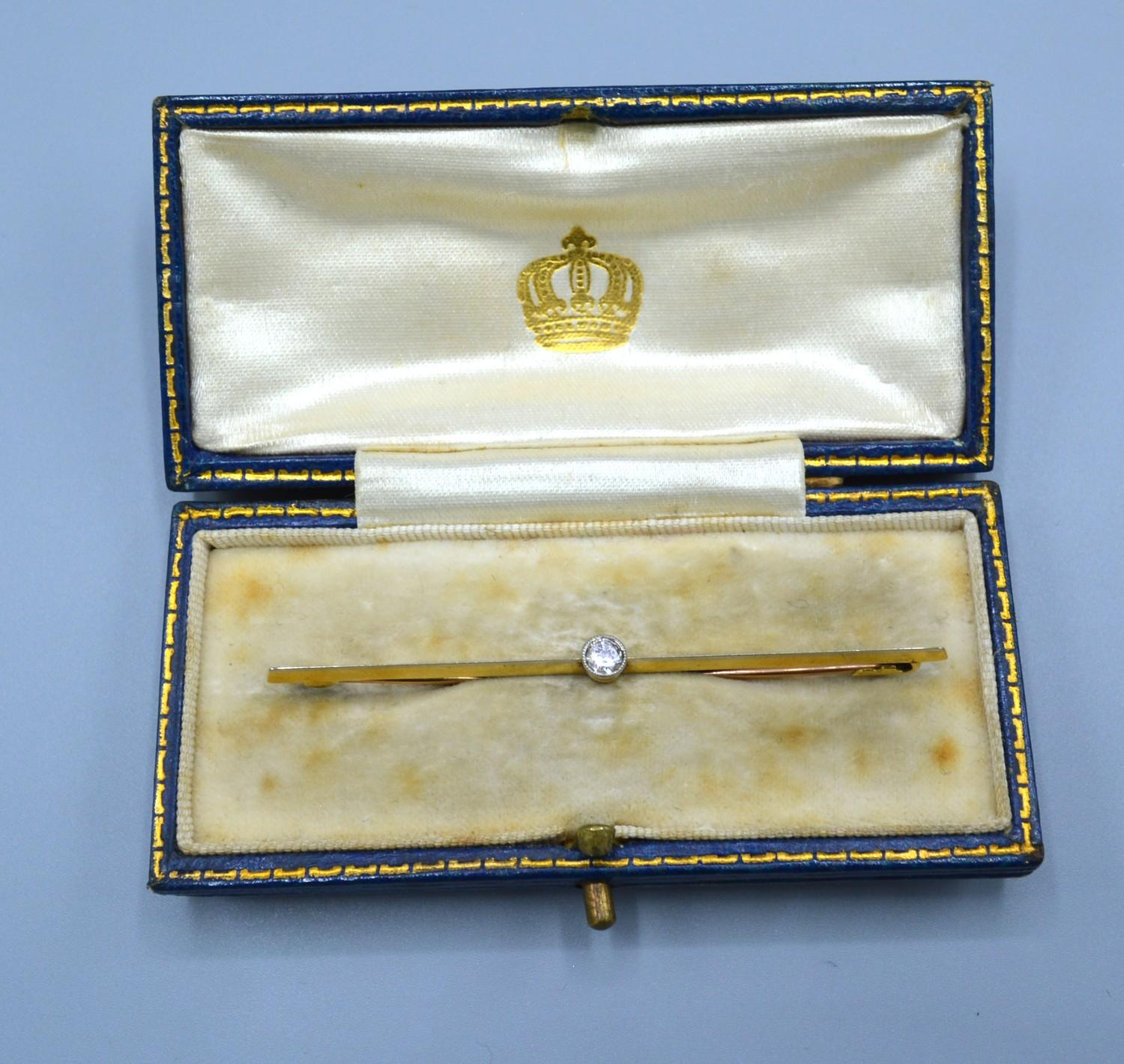 A 15ct Gold Bar Brooch set with a Solitaire Diamond 2.7 grams