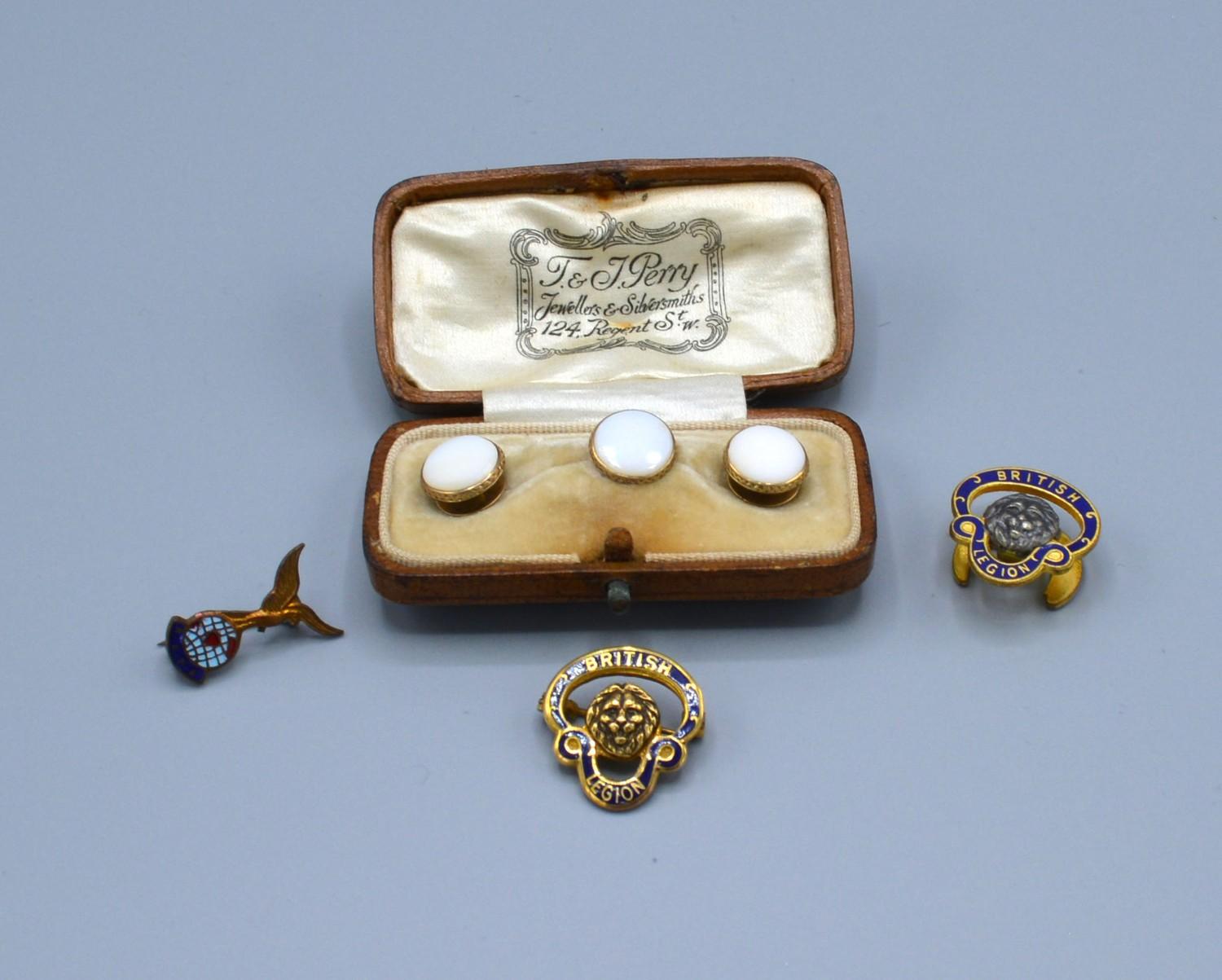 A 9ct Gold and Enamel Set British Legion Badge together with two other badges and a set of three