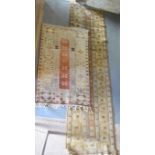 A Turkish Woollen Rug with an all over design upon a cream ground within multiple borders, 280cm x