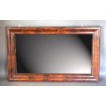 A Late 19th Early 20th Century Mahogany Cushion Wall Mirror of rectangular form 79cm x 129cm