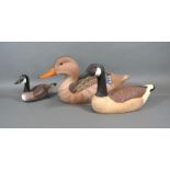 A Hornick Brothers Stoney Point Decoys Carved Wooden and Painted Decoy duck together with two