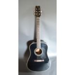 A Washburn Acoustic Guitar with soft case