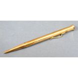 A 9ct. Gold Propelling Pencil 'The Mascot' 12 cms long