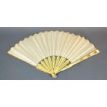 An Early 20th Century Double-leafed Silk Fan with carved bone sticks and guards with gilded