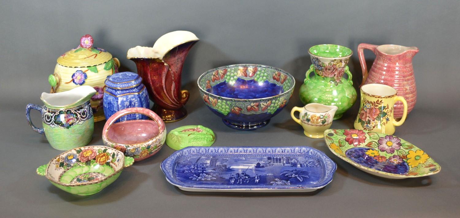 A Collection of Maling to include a biscuit barrel, various jugs, vases and bowls and a Carlton Ware