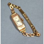 A 9ct Gold Cased Ladies Wristwatch with 9ct Gold Strap 8.6grams excluding movement