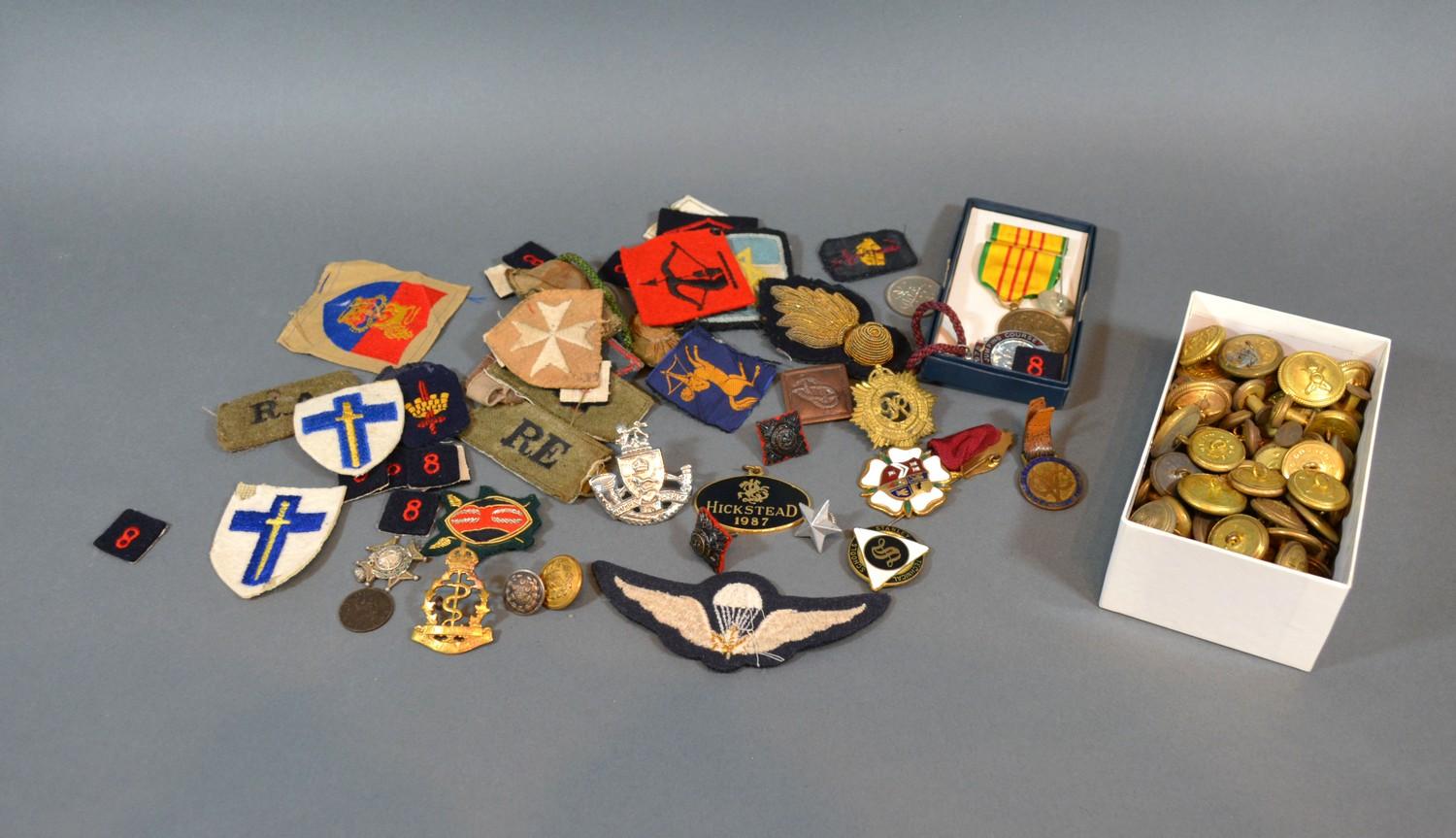 A Collection of Military Badges together with other related items to include coins and buttons