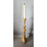 An 18th Century Style Gilded Lamp Standard with triform base, 150 cms tall