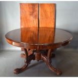A Victorian Mahogany Wind-out Extending Dining Table /Centre Table, a moulded top above a plain