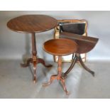 A 19th Century Mahogany Circular Tilting Pedestal Table together with a similar wine table,