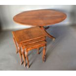 A Nest of Three Queen Anne Style Walnut Occasional Tables with shell carved cabriole legs and pad