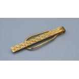 A 9ct Gold Tie Pin with engine turned decoration 4.9grams