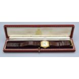 A 9ct Gold Cased Wrist Watch with leather strap the reverse bearing inscription within a case for