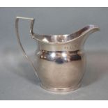 A George III Silver Cream Jug with Shaped Handle London 1799 6oz