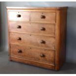 A Victorian Mahogany Straight Front Chest with two short and three long drawers with knob handles