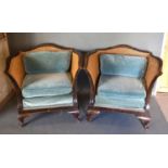 A Pair of Large Late 19th Century Bergere Armchairs each of shaped form with double caning raised
