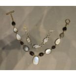 A 925 Silver Necklace, together with a similar 925 silver bracelet set clear stones