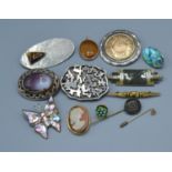 A Small Collection of Jewellery to include a stick pin, various brooches and other jewellery