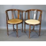 A Pair of Edwardian Mahogany and Line Inlaid tub-shaped chairs with pierced panel backs above