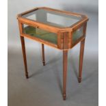An Edwardian Mahogany Satinwood Inlaid Bijouterie with square tapering legs and spayed feet 57cm