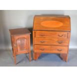 A Edwardian Mahogany Satinwood inlaid bureau with a fall front above three long drawers together