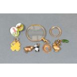 A 18ct Gold and Enamel Mounted Cufflink together with other items to include four small charms, a