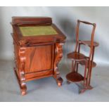 A Reproduction Mahogany Davenport together with an Edwardian folding cake stand