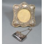An Edwardian Silver Photograph Frame decorated whispers Birmingham 1905 16cm x 16cm together with