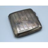 A Birmingham Silver Cigarette Case with engine turned decoration