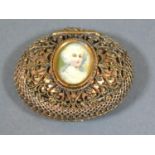 A Late 19th/Early 20th Century Oval Gilded Filigree Snuff Box the hinged cover inset with a portrait