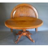 A Victorian Mahogany Oval Centre Table together with a burr walnut head board