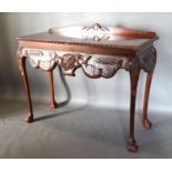 A George III Style Mahogany Console Table by Higginbottom of Dublin with a low galleried back