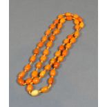 A Butterscotch Amber Bead Necklace 81cm long, 31 grams