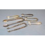 A Pair of Victorian Silver Sugar Tongs London 1841 together with five other pairs of sugar tongs