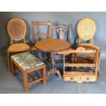 A Victorian Walnut Occasional Table together with four side chairs, a swing-framed toilet mirror,