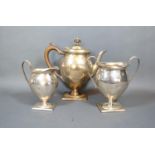 A George V Silver Three-Piece Tea Service Comprising Teapot, Sucrier and Cream Jug all of oviform