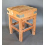 A Pine Butchers Block with square legs with stretchers 62cm square, 84cm tall